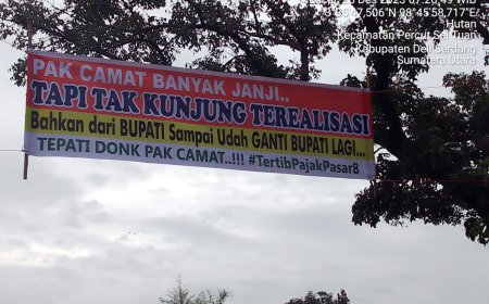 Melalui Spanduk, Masyarakat Pasar 8 Menuliskan Kekecewaan Terhadap Janji Manis Camat