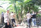Bantu Warga, Personel Polres Binjai Gotong Royong Bersihkan Sampah Akibat Banjir