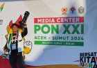 Ketika Fotografer Media Offisial PON XXI Aceh-Sumut 2024 Risky Cahyadi Jadi Idola Atlet Gulat