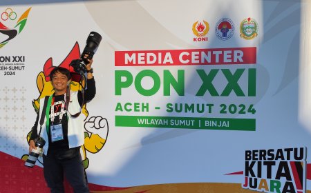 Ketika Fotografer Media Offisial PON XXI Aceh-Sumut 2024 Risky Cahyadi Jadi Idola Atlet Gulat