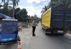 Personel Sat Lantas Laksanakan Pengaturan Lalu Lintas dan Live Raport