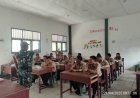 Bangun Karakter Pelajar, Babinsa Beri Materi Kebangsaan dan Anti Narkoba di SMK N 1 Raya