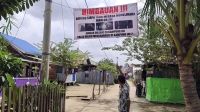 Resah Uang Hilang Misterius, Warga Jakabaring Palembang Pasang Baliho Sindiran Pemilik Tuyul