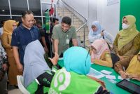 Dekatkan Layanan Medis untuk Pekerja Jalanan, Gubernur Bobby Suarakan Perlindungan BPJS Bagi Driver Ojol